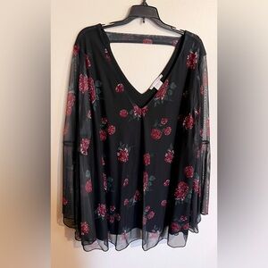 Woman’s K. Jordan floral top with bell sleeves